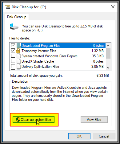 Screenshot of Disk Cleanup for C showing how much space can be freed up with selectable categories to clean. Also showing Clean up System Files button which should be clicked